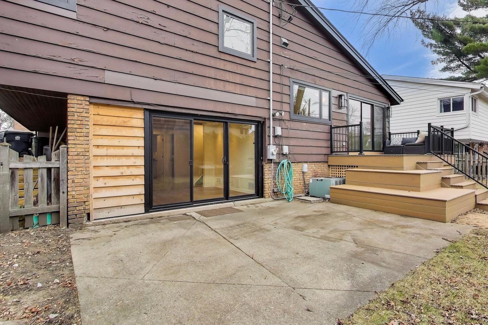 3530 Hillside Road Evanston, IL 60201 - Photo 22 of 27 a front view of a house with a garage