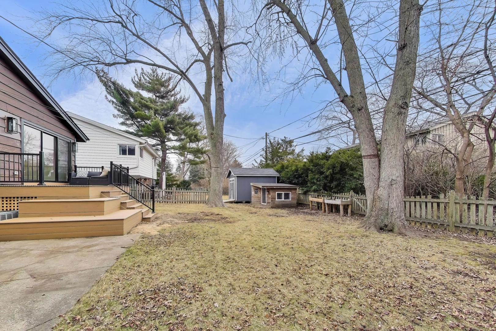 3530 Hillside Road Evanston, IL 60201 - Photo 23 of 27 a view of a house with a yard and sitting area