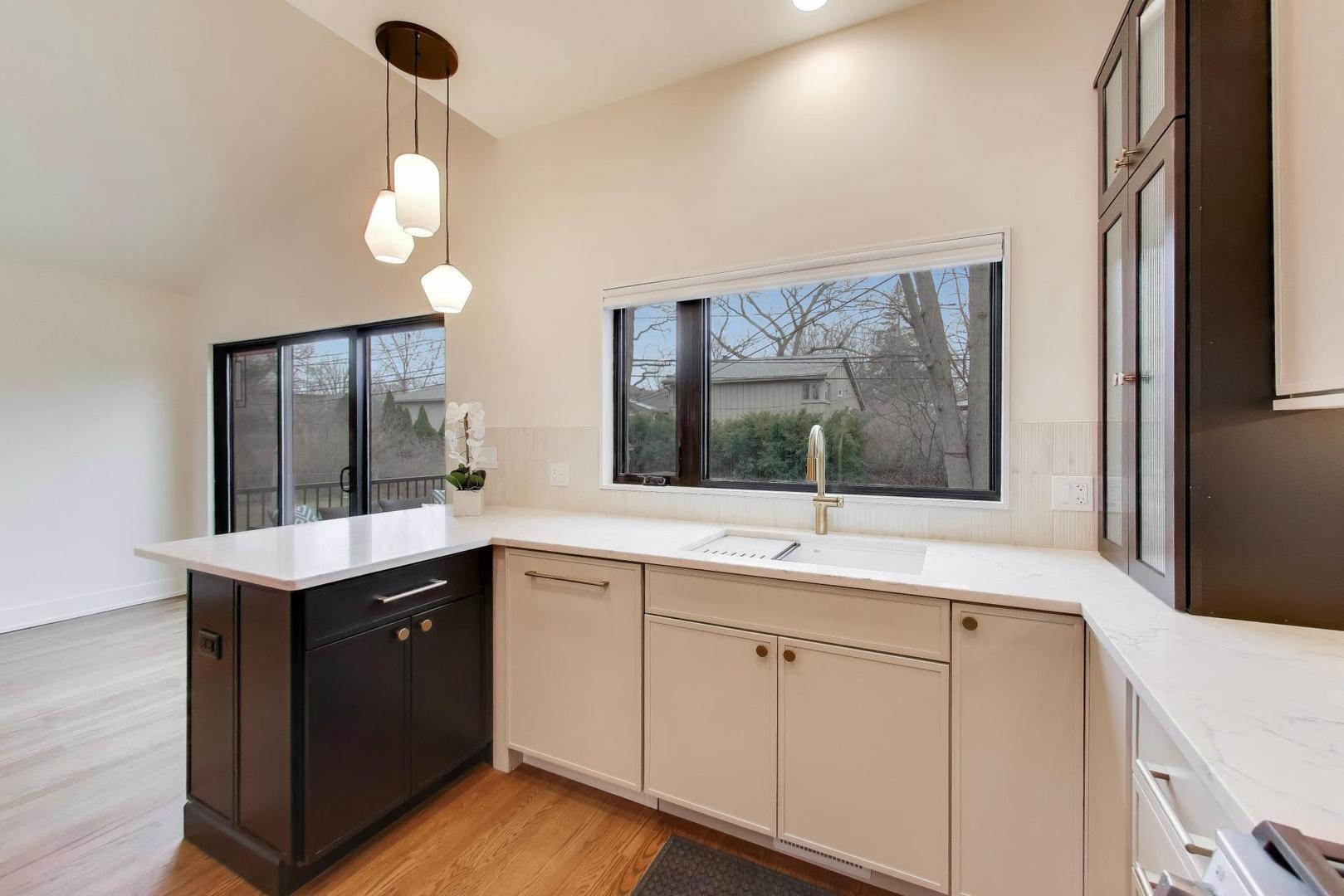 3530 Hillside Road Evanston, IL 60201 - Photo 8 of 27 a kitchen with a sink and window