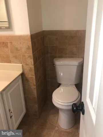a bathroom with a toilet and a sink
