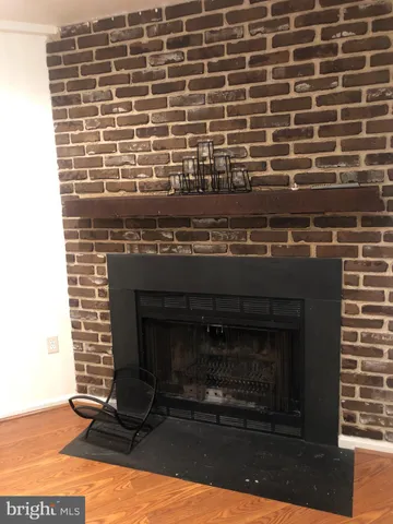 a stove top oven sitting inside of a kitchen