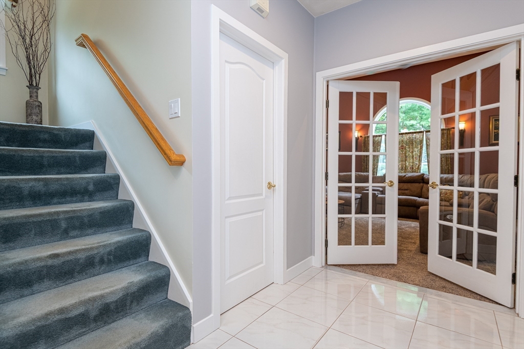 11 Hood Farm Road Ipswich, MA 01938 - Photo 20 of 42 a view of entryway and hall with wooden floor and windows