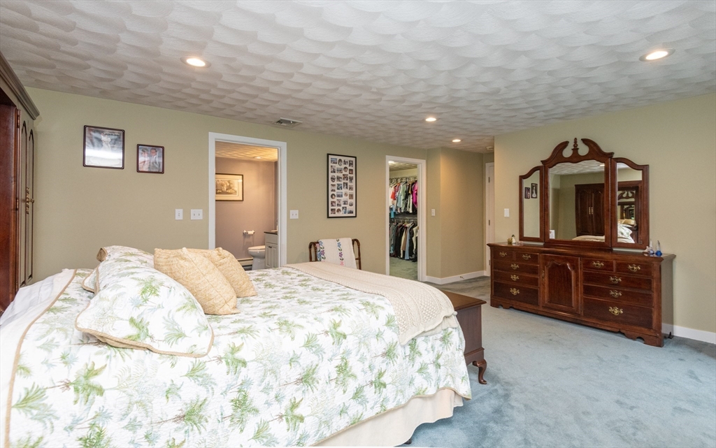 11 Hood Farm Road Ipswich, MA 01938 - Photo 27 of 42 a bedroom with a bed and a dresser
