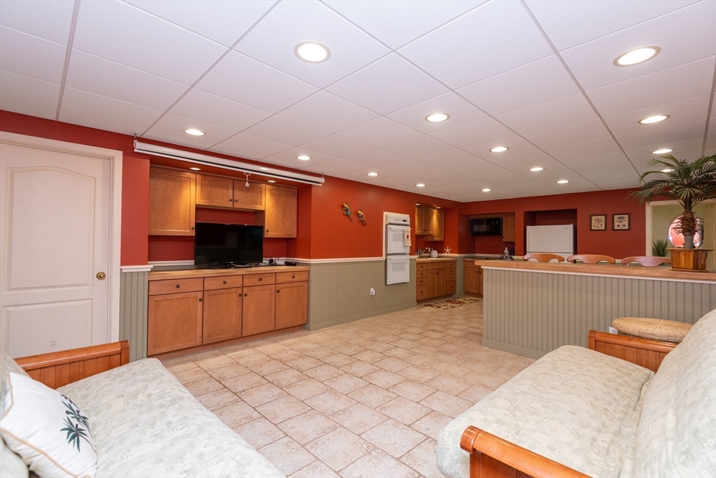 11 Hood Farm Road Ipswich, MA 01938 - Photo 30 of 42 a large kitchen with a sink and a large window