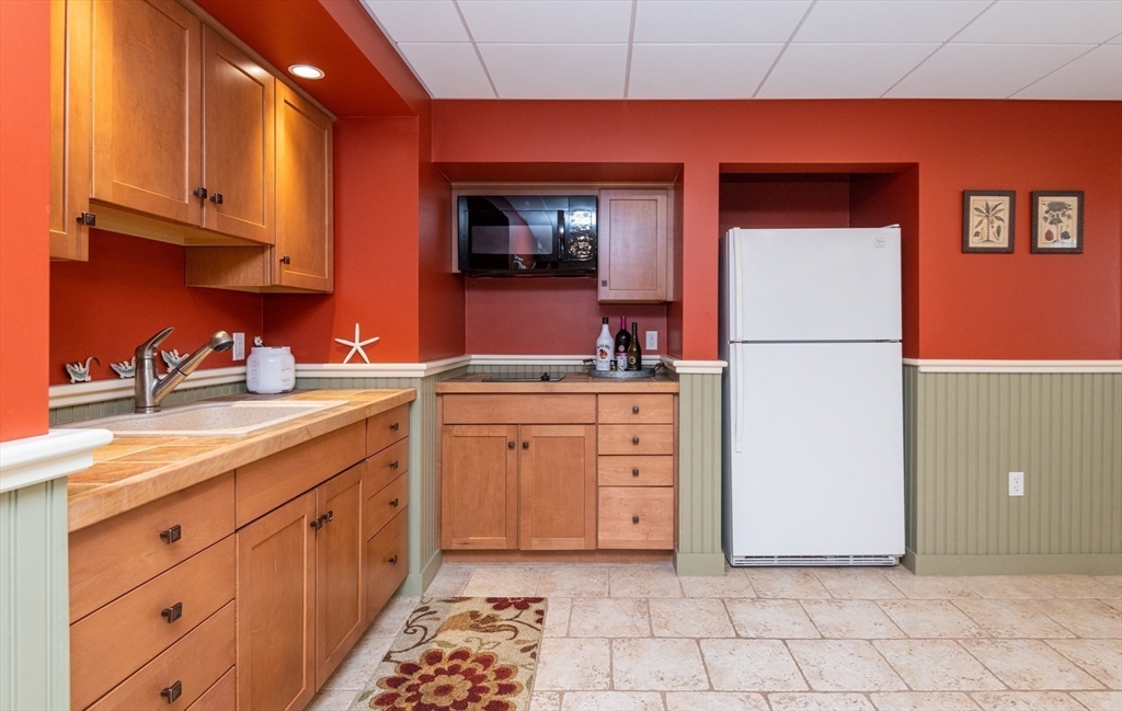 11 Hood Farm Road Ipswich, MA 01938 - Photo 31 of 42 a kitchen with sink cabinets and appliances