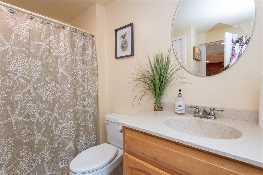 11 Hood Farm Road Ipswich, MA 01938 - Photo 32 of 42 a bathroom with a sink toilet and mirror