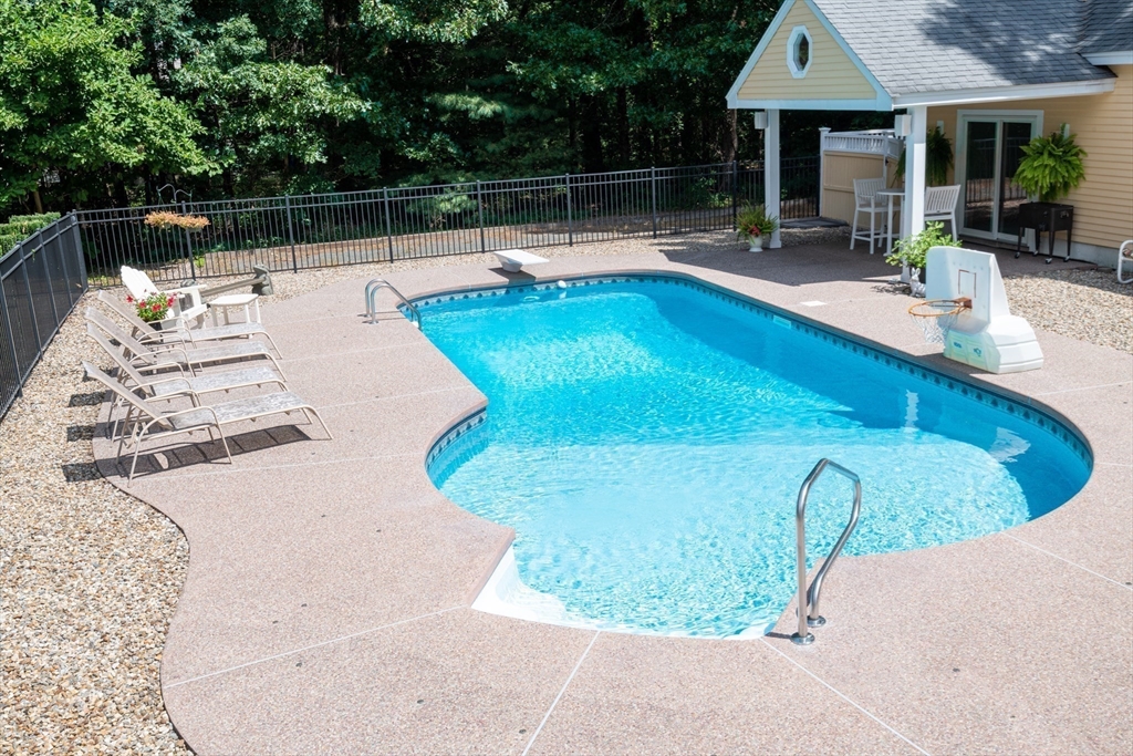 11 Hood Farm Road Ipswich, MA 01938 - Photo 41 of 42 a view of a swimming pool with a patio