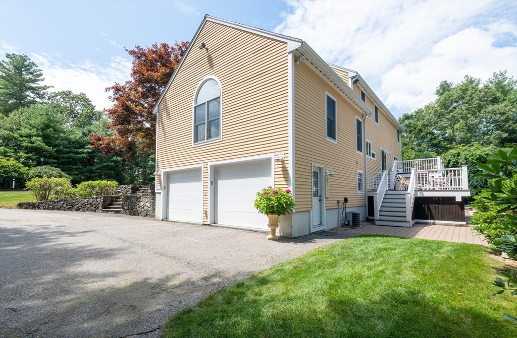 11 Hood Farm Road Ipswich, MA 01938 - Photo 5 of 42 a view of a house with backyard and a garden