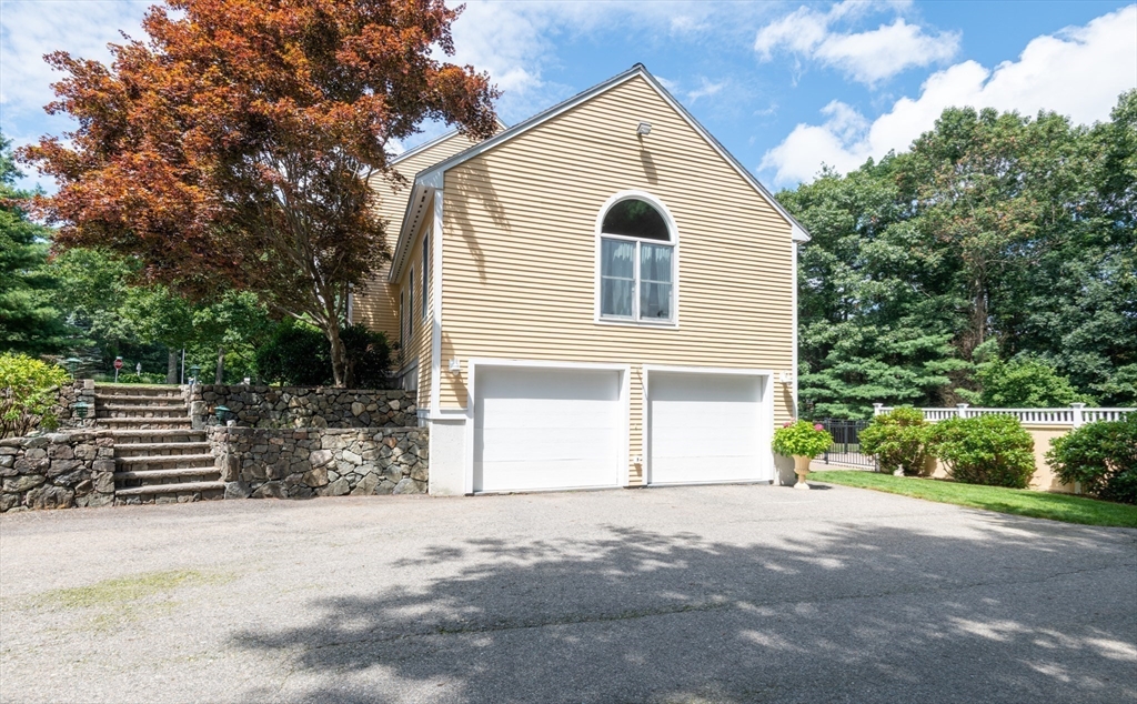 11 Hood Farm Road Ipswich, MA 01938 - Photo 7 of 42 a view of a house with a yard and garage