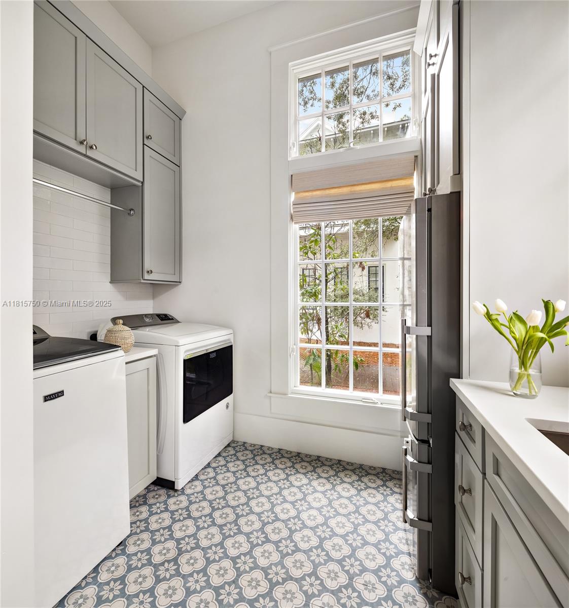 25 North Belize Lane Inlet Beach, FL 32461 - Photo 12 of 35 a kitchen with a stove a sink and a window