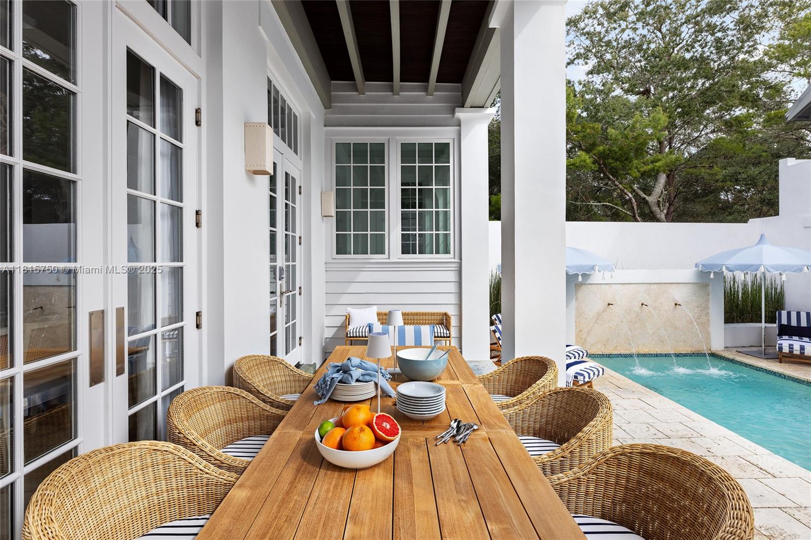 25 North Belize Lane Inlet Beach, FL 32461 - Photo 13 of 35 a view of a patio with couches chairs and potted plants