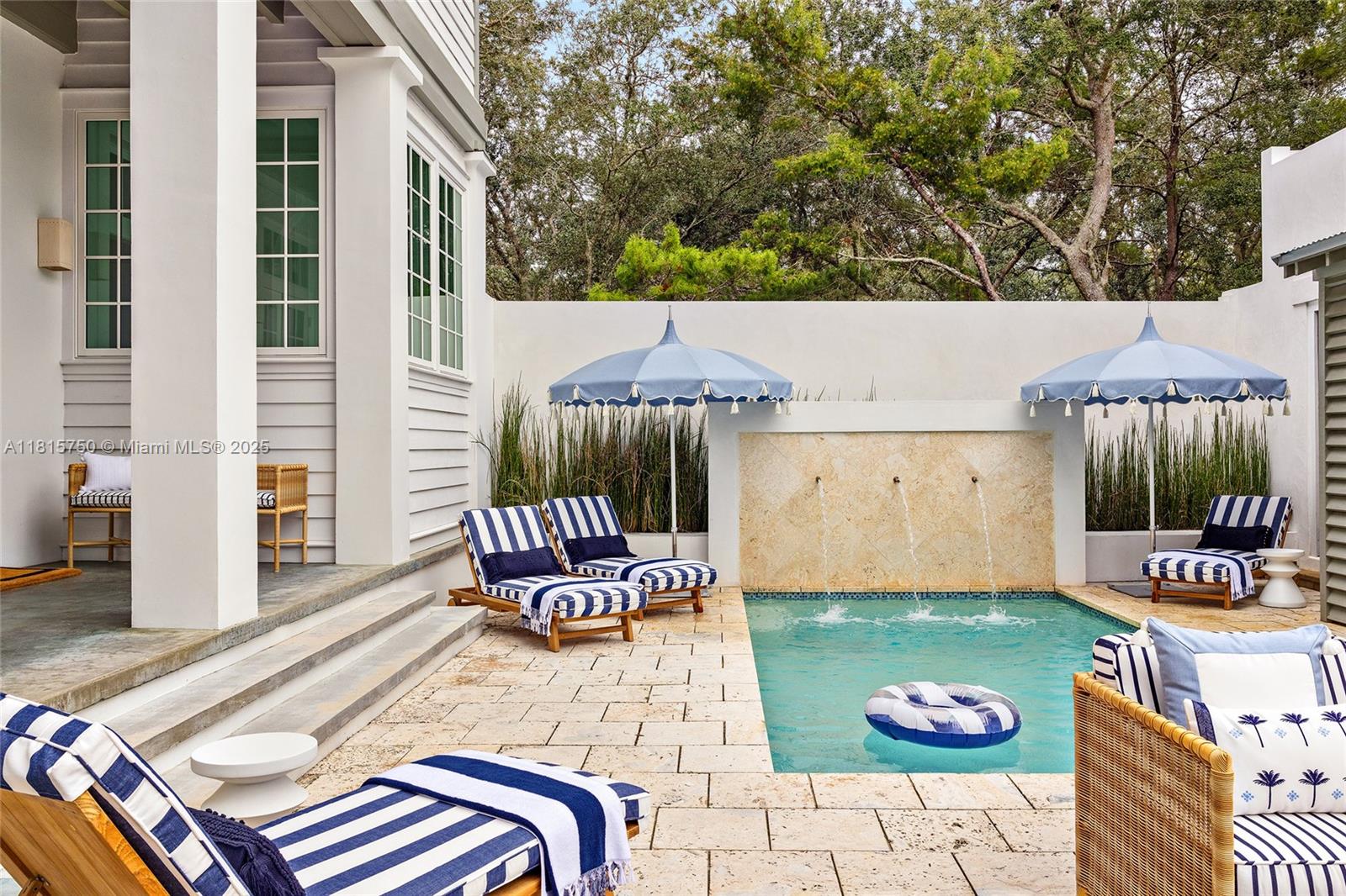 25 North Belize Lane Inlet Beach, FL 32461 - Photo 15 of 35 a backyard of a house with seating space