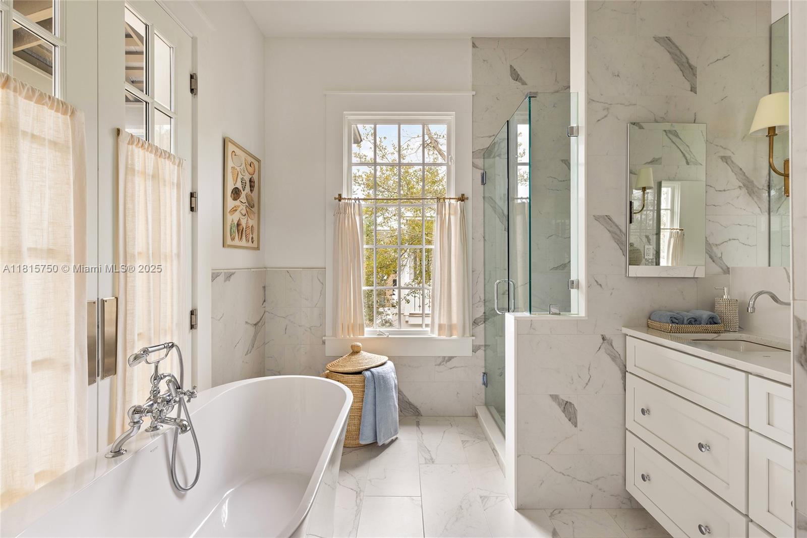 25 North Belize Lane Inlet Beach, FL 32461 - Photo 23 of 35 a spacious bathroom with a granite countertop tub sink a mirror a shower and vanity