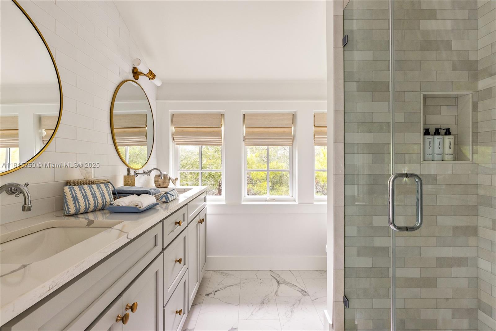 25 North Belize Lane Inlet Beach, FL 32461 - Photo 27 of 35 a bathroom with a granite countertop sink a large mirror and a shower