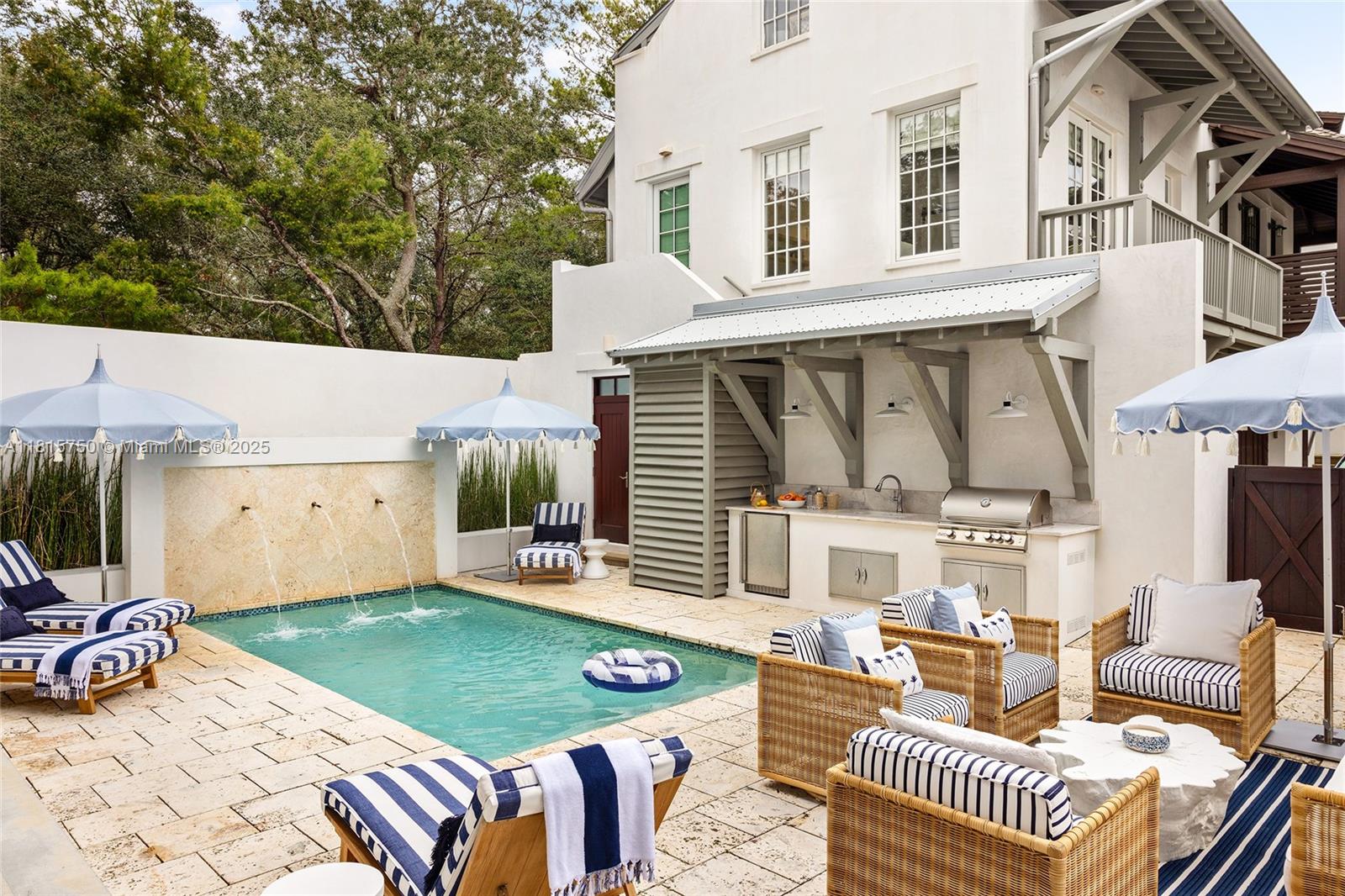 25 North Belize Lane Inlet Beach, FL 32461 - Photo 5 of 35 a view of a patio with table and chairs with wooden floor and fence
