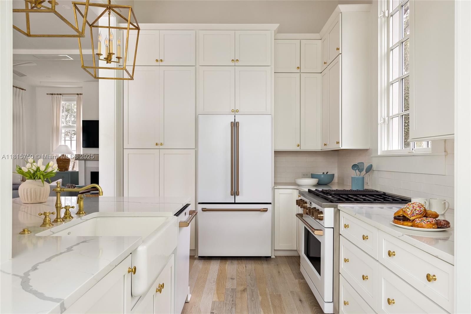 25 North Belize Lane Inlet Beach, FL 32461 - Photo 8 of 35 a kitchen with stainless steel appliances a refrigerator sink and cabinets