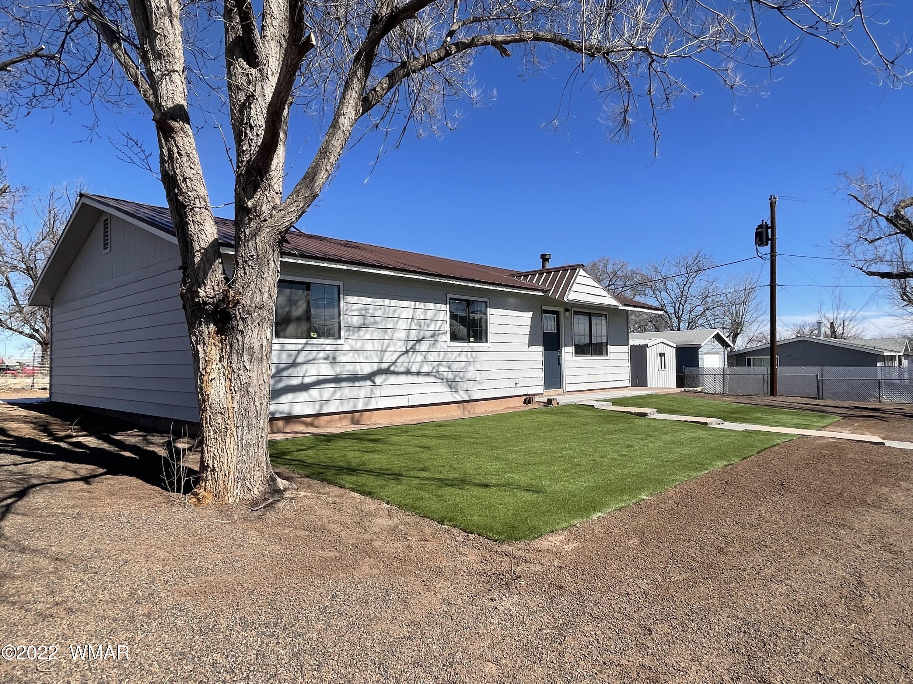 118 East 9th S Street Snowflake, AZ 85937 - Photo 19 of 19 a front view of a house with garden