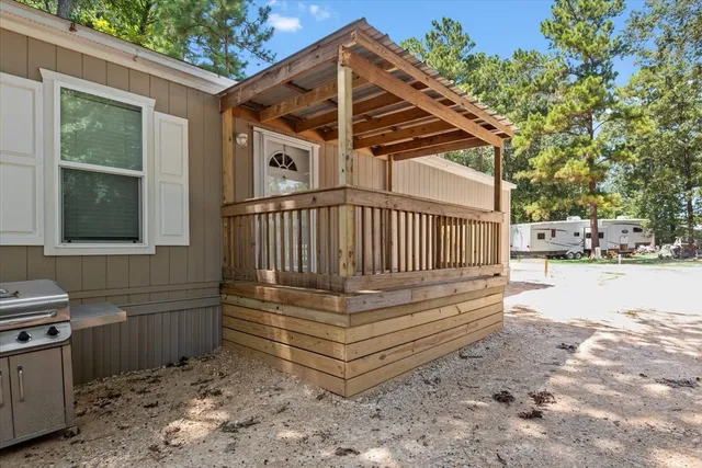 a view of backyard with deck