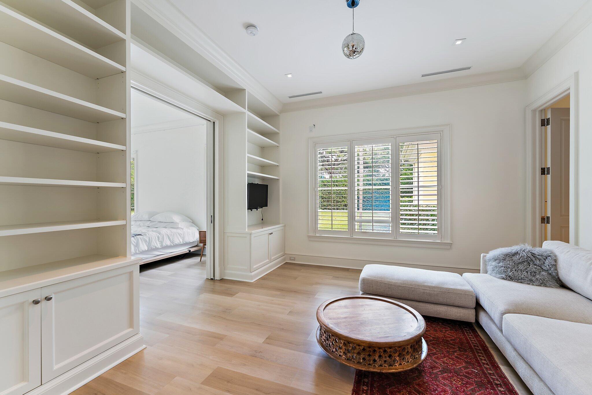 124 Bears Club Drive Jupiter, FL 33477 - Photo 34 of 67 a living room with furniture and a large window