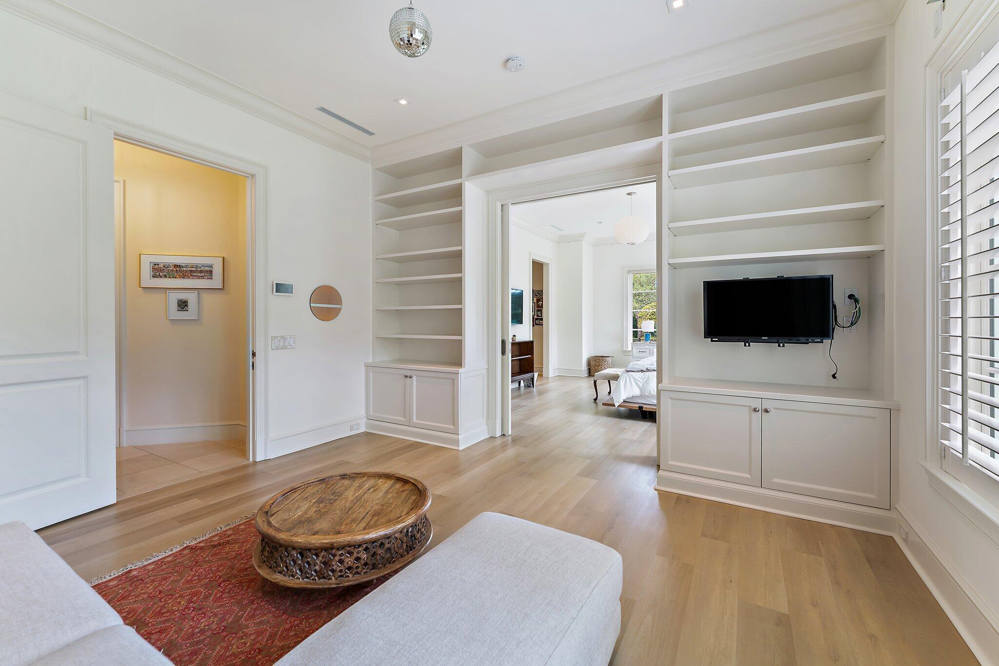 124 Bears Club Drive Jupiter, FL 33477 - Photo 35 of 67 a living room with furniture and a flat screen tv