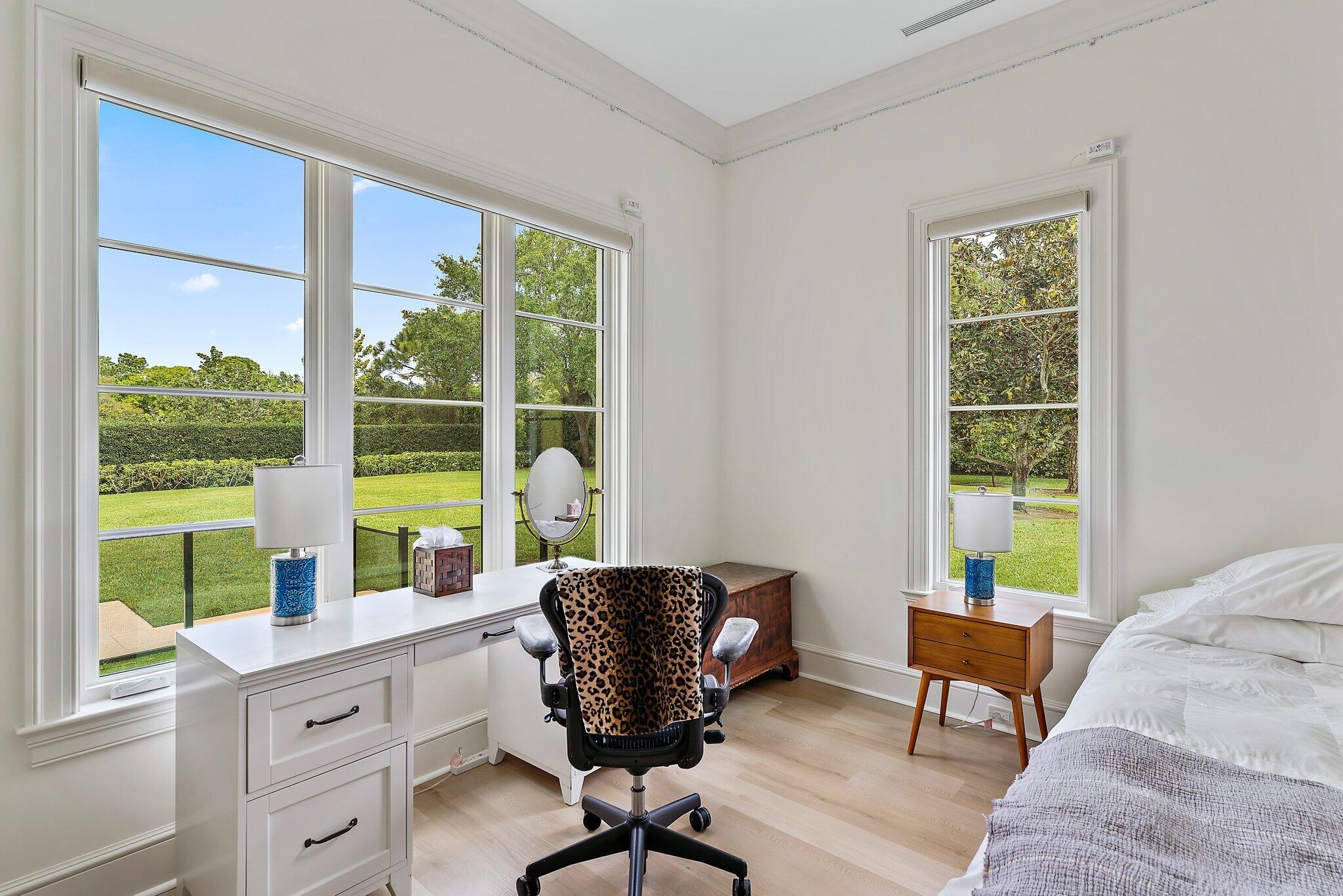 124 Bears Club Drive Jupiter, FL 33477 - Photo 37 of 67 a living room with furniture and a window