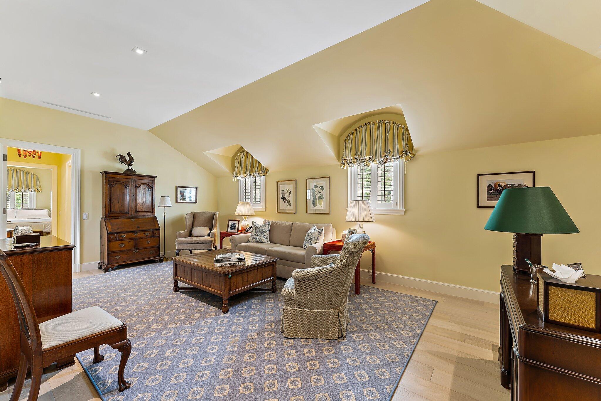 124 Bears Club Drive Jupiter, FL 33477 - Photo 46 of 67 a living room with furniture and a lamp