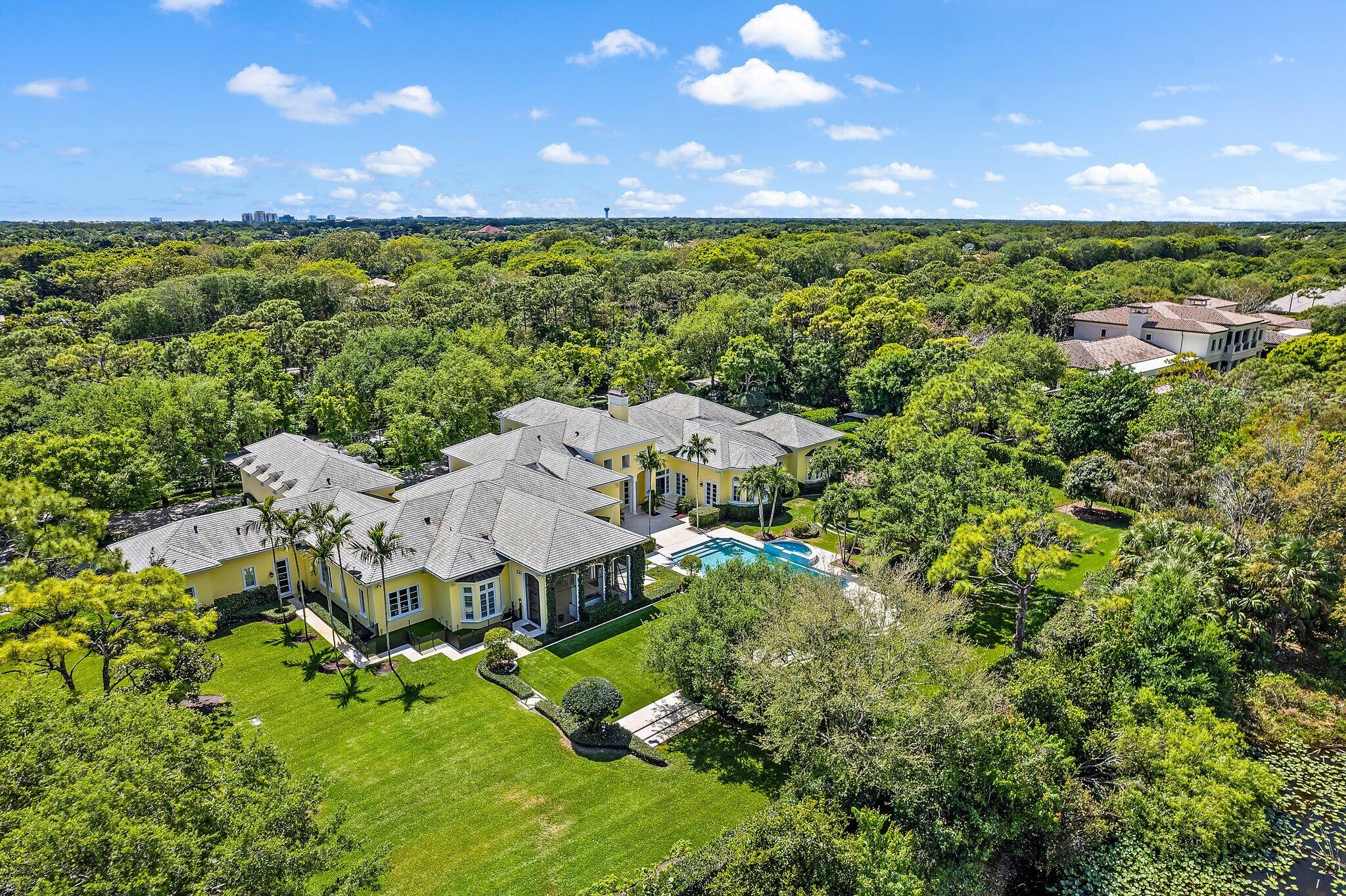 124 Bears Club Drive Jupiter, FL 33477 - Photo 67 of 67 a view of an outdoor space and a yard