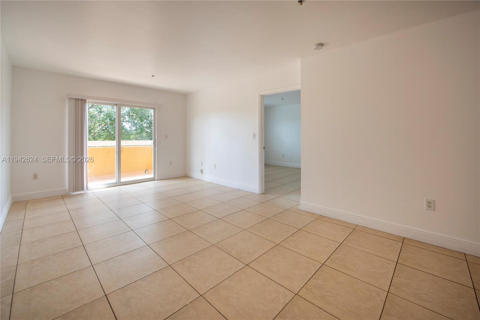 4137 Stirling Road, Unit 506 Dania Beach, FL 33314 - Photo 8 of 13 a view of an empty room with a window