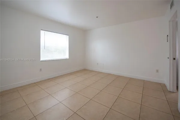 an empty room with a window