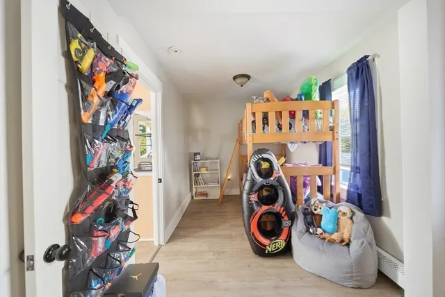 a kitchen with granite countertop a sink and a refrigerator