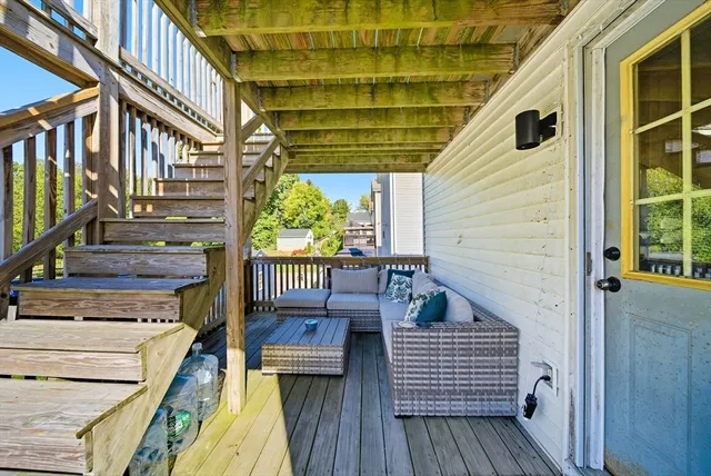 a view of a couches on the roof deck
