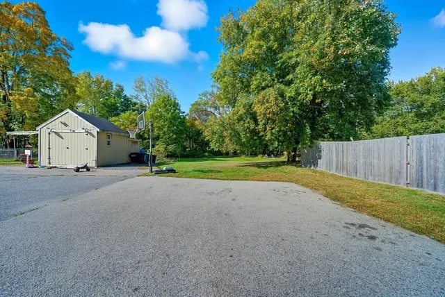 a view of balcony with wooden floor