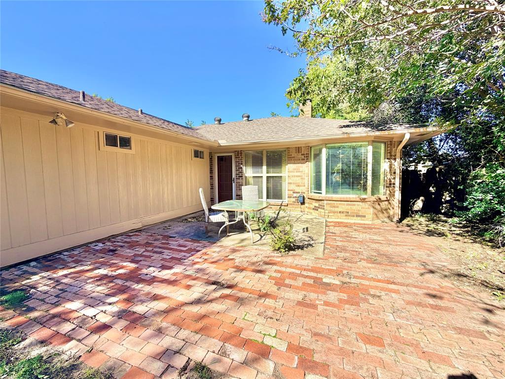 1821 Broadway Street Denton, TX 76201 - Photo 18 of 21 a view of a backyard with a patio