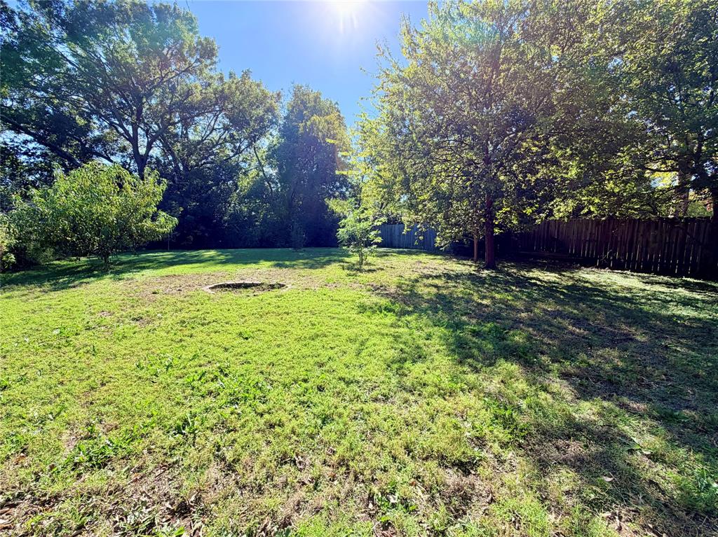 1821 Broadway Street Denton, TX 76201 - Photo 19 of 21 a big yard with lots of green space and plants
