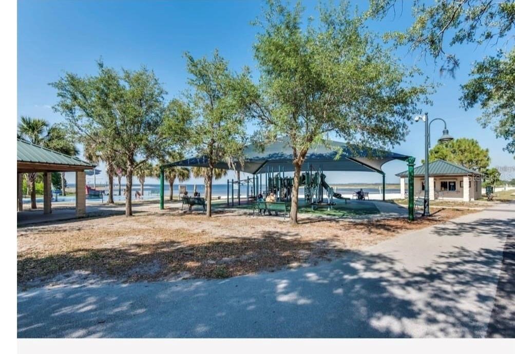 922 Delaware Avenue St. Cloud, FL 34769 - Photo 24 of 31 a front view of a house with a yard