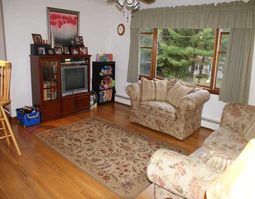56 Sandy Point Road Milford, ME 04461 - Photo 8 of 25 Living Room.