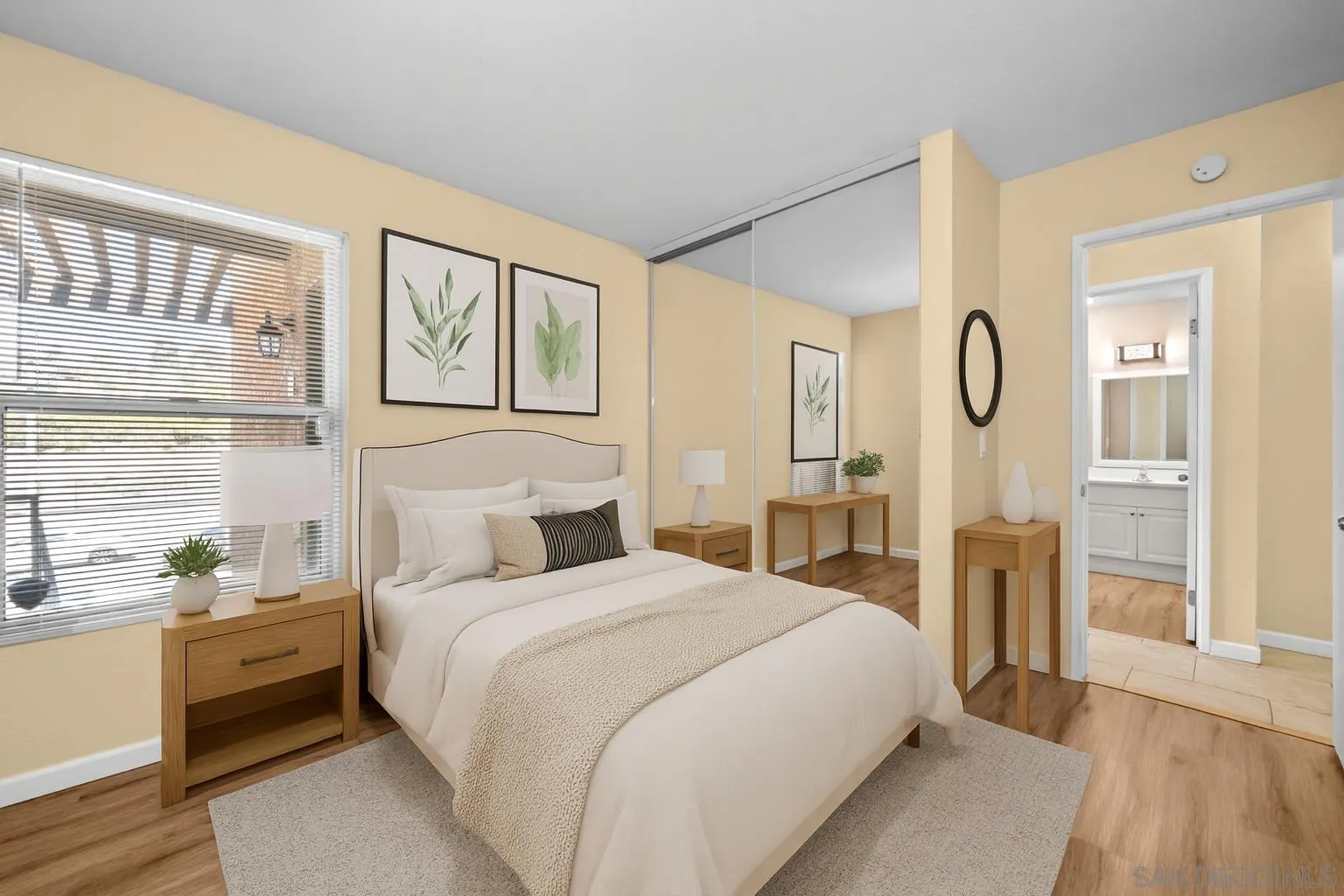 6911 Alvarado Road, Unit 20 San Diego, CA 92120 - Photo 11 of 28 a bedroom with a large bed and a window