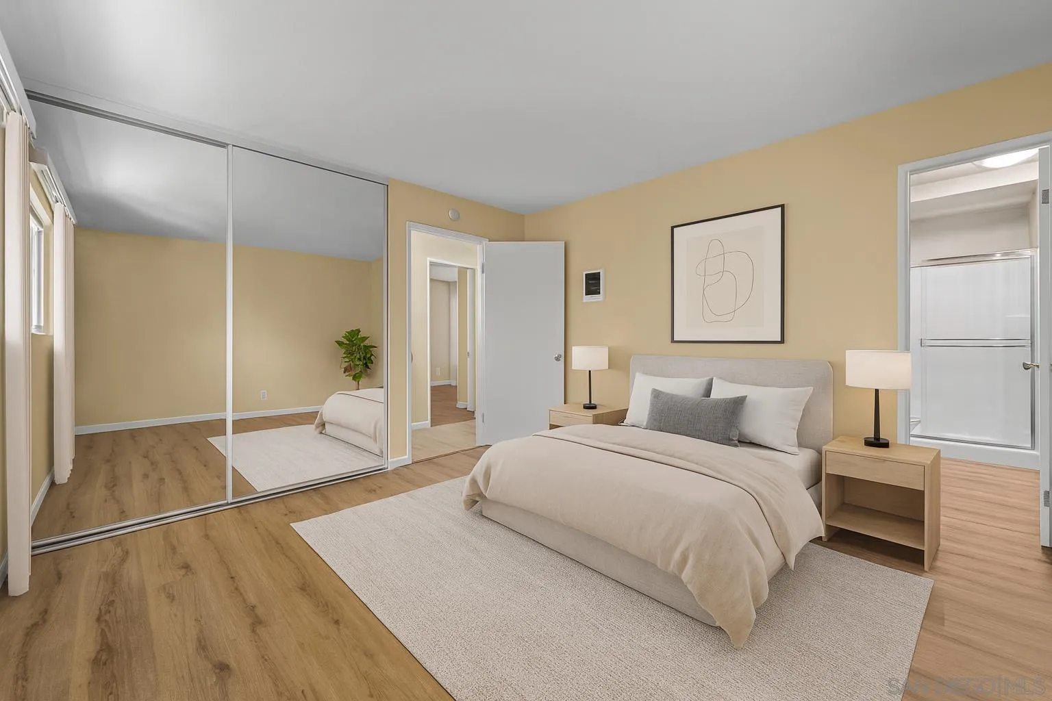 6911 Alvarado Road, Unit 20 San Diego, CA 92120 - Photo 15 of 28 a bedroom with a bed and a walk in closet