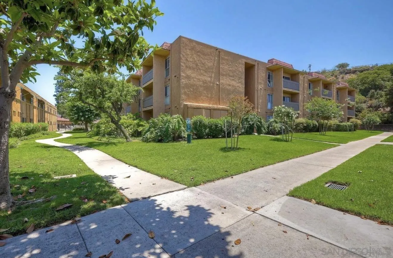 6911 Alvarado Road, Unit 20 San Diego, CA 92120 - Photo 24 of 28 a view of a building with garden