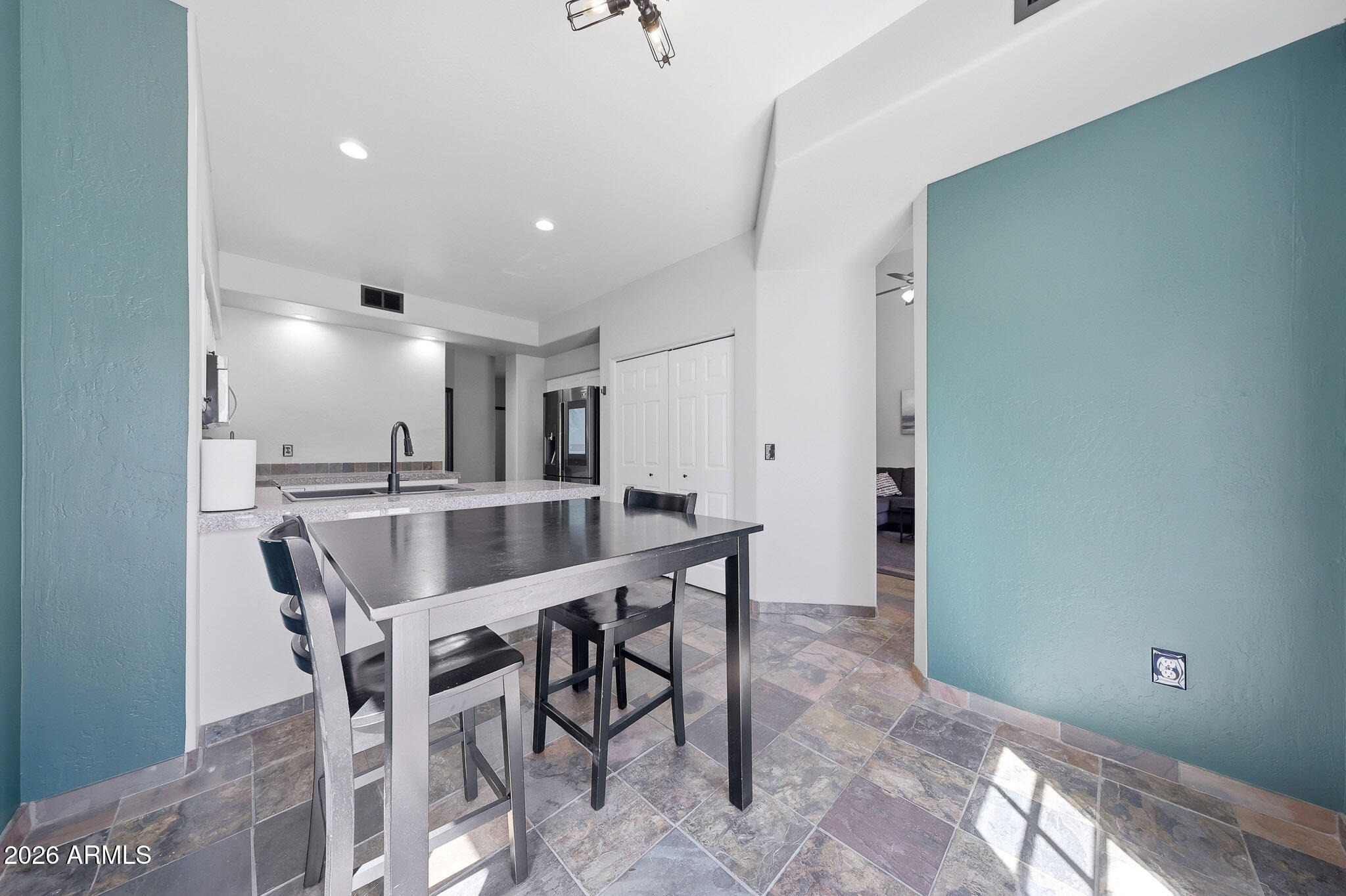 2167 East Nighthawk Way Phoenix, AZ 85048 - Photo 13 of 28 a view of a dining room with furniture