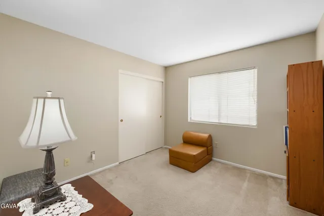 a room with furniture and a window