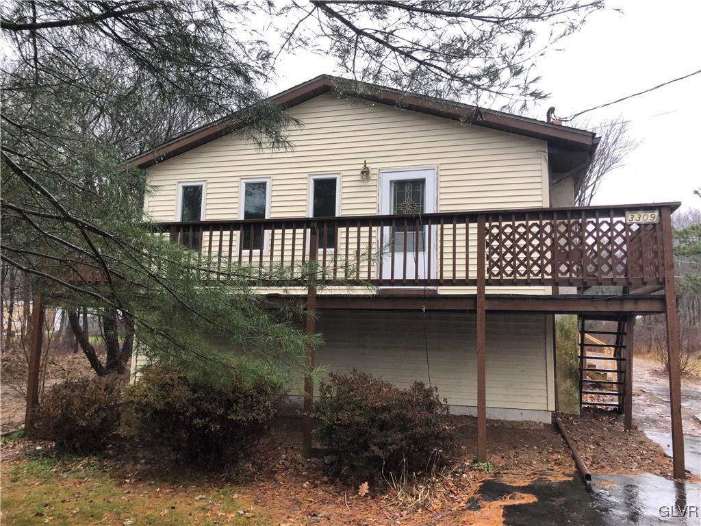 3309 Aspen Road Kunkletown, PA 18058 - Photo 1 of 13 a front view of a house with balcony