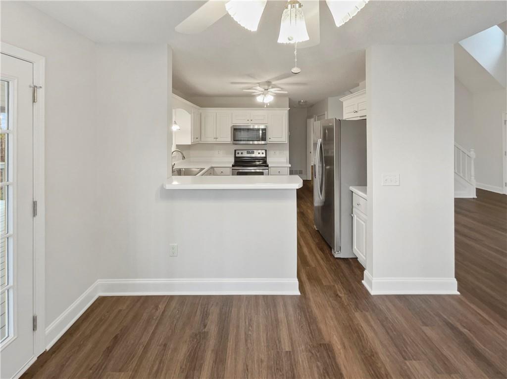 185 Thrasher Lane Jasper, GA 30143 - Photo 13 of 32 a view of a kitchen with wooden floor