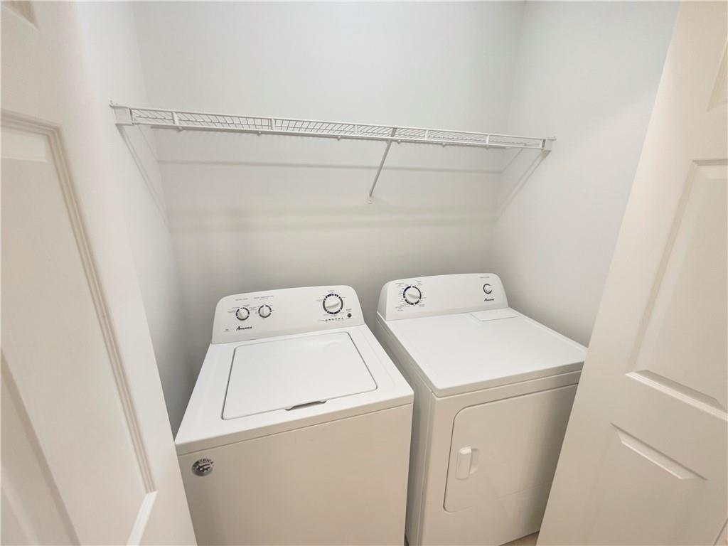 185 Thrasher Lane Jasper, GA 30143 - Photo 24 of 32 a utility room with dryer and washer