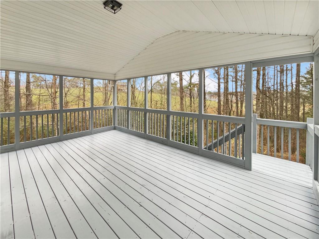 185 Thrasher Lane Jasper, GA 30143 - Photo 28 of 32 a view of a balcony with wooden floor