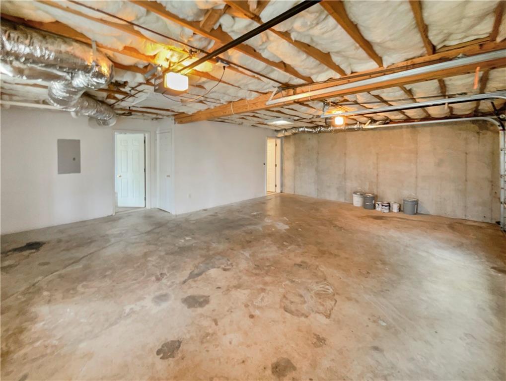 185 Thrasher Lane Jasper, GA 30143 - Photo 29 of 32 a view of a room with a garage