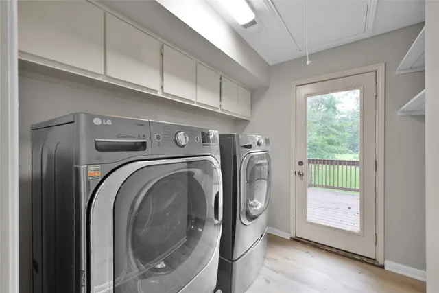 a utility room with dryer and washer