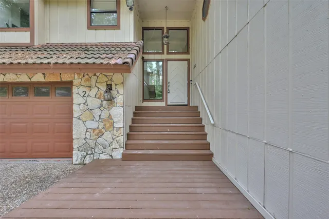a view of entryway with wooden floor