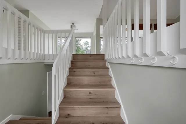 a view of entryway with wooden floor