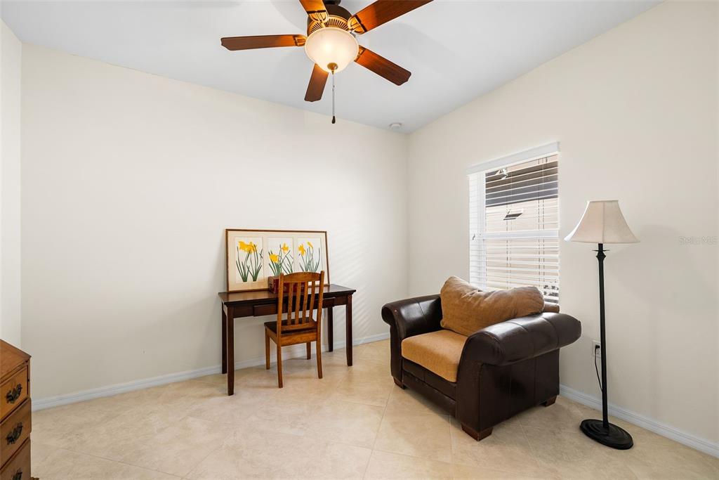 7638 Southwest 80th Drive Gainesville, FL 32608 - Photo 20 of 48 a work room with furniture and a window